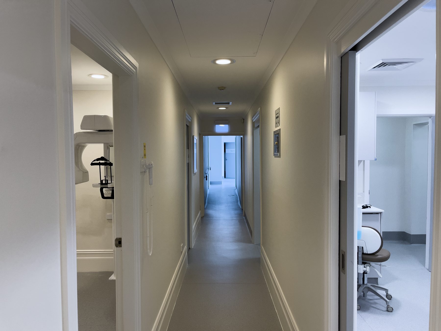The light-filled corridor leading to the treatment and imaging rooms at Optimal Dental Care